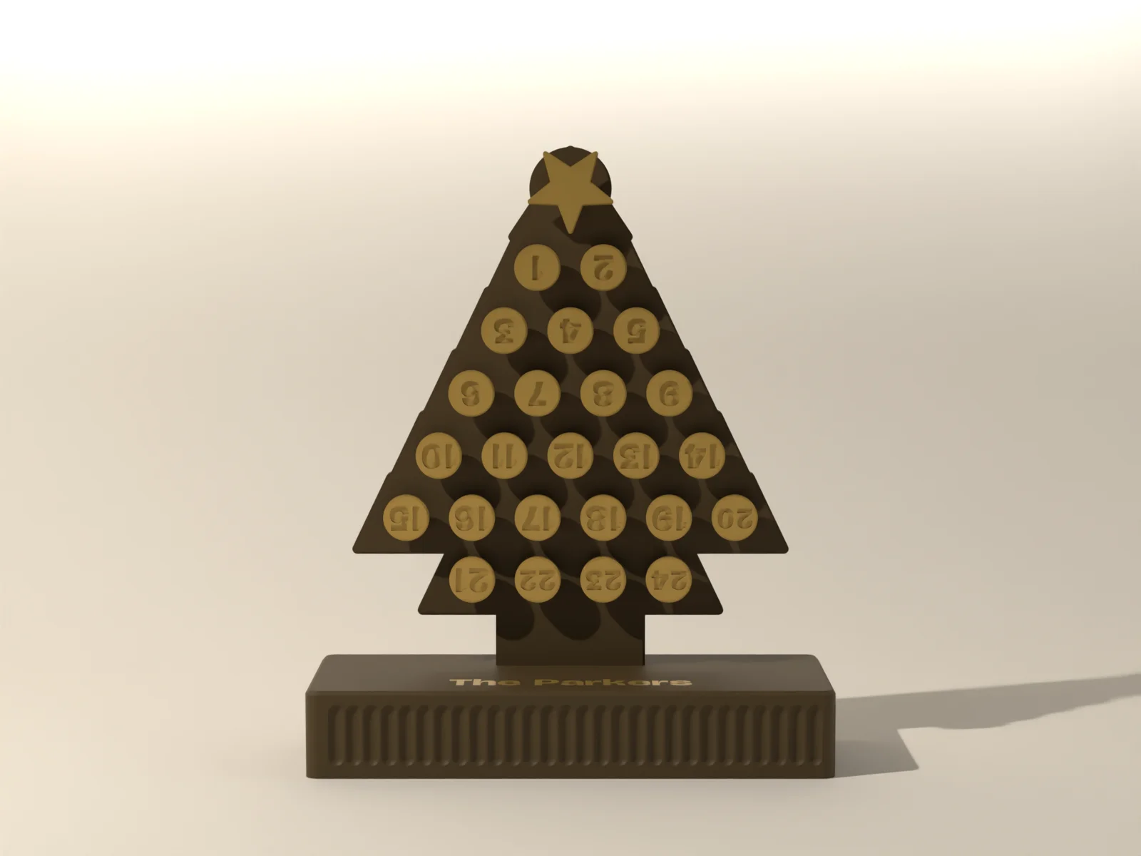 Close view of the silk gold tokens on their pegs and the fluted front of the base