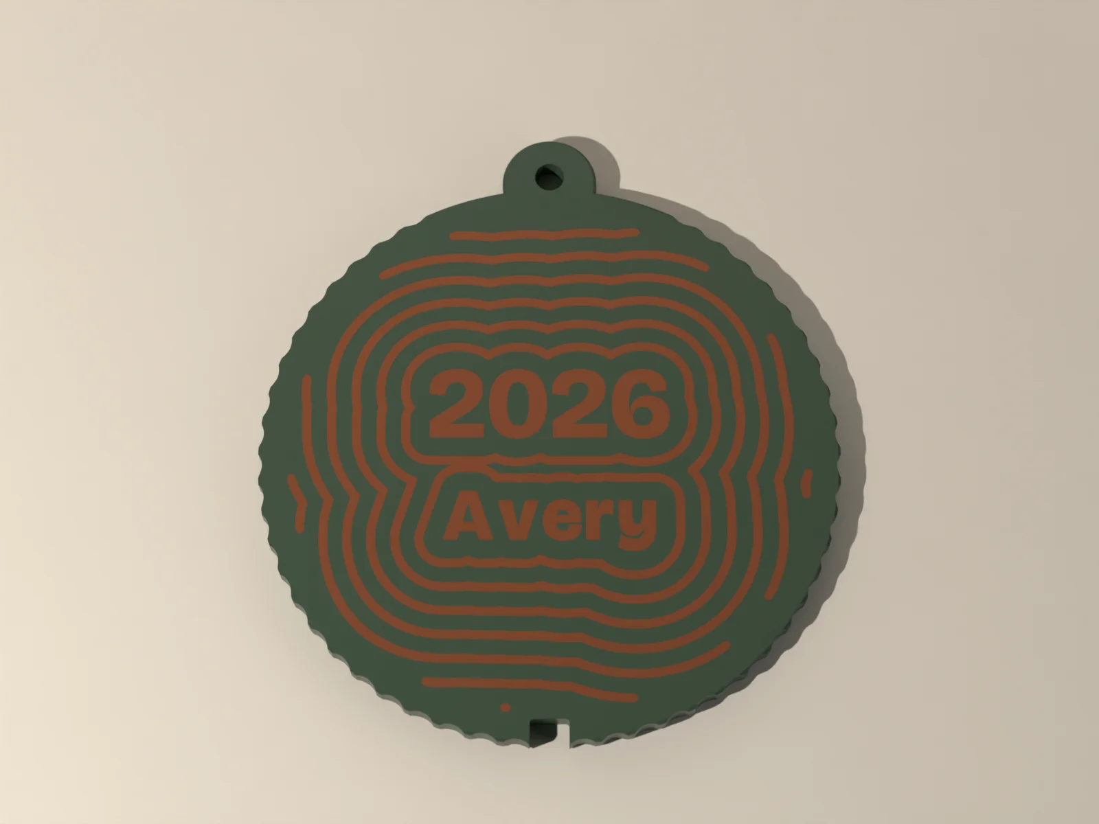 Club ornament from the front, the year and the name at the center of the rings