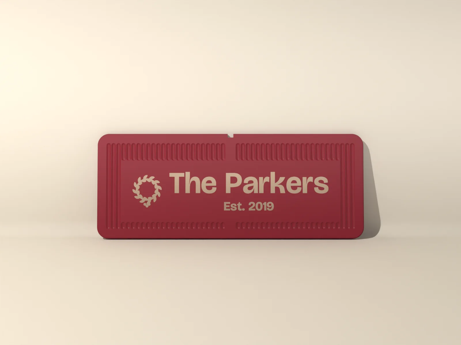 Holiday plaque from the front, the motif left of the family name