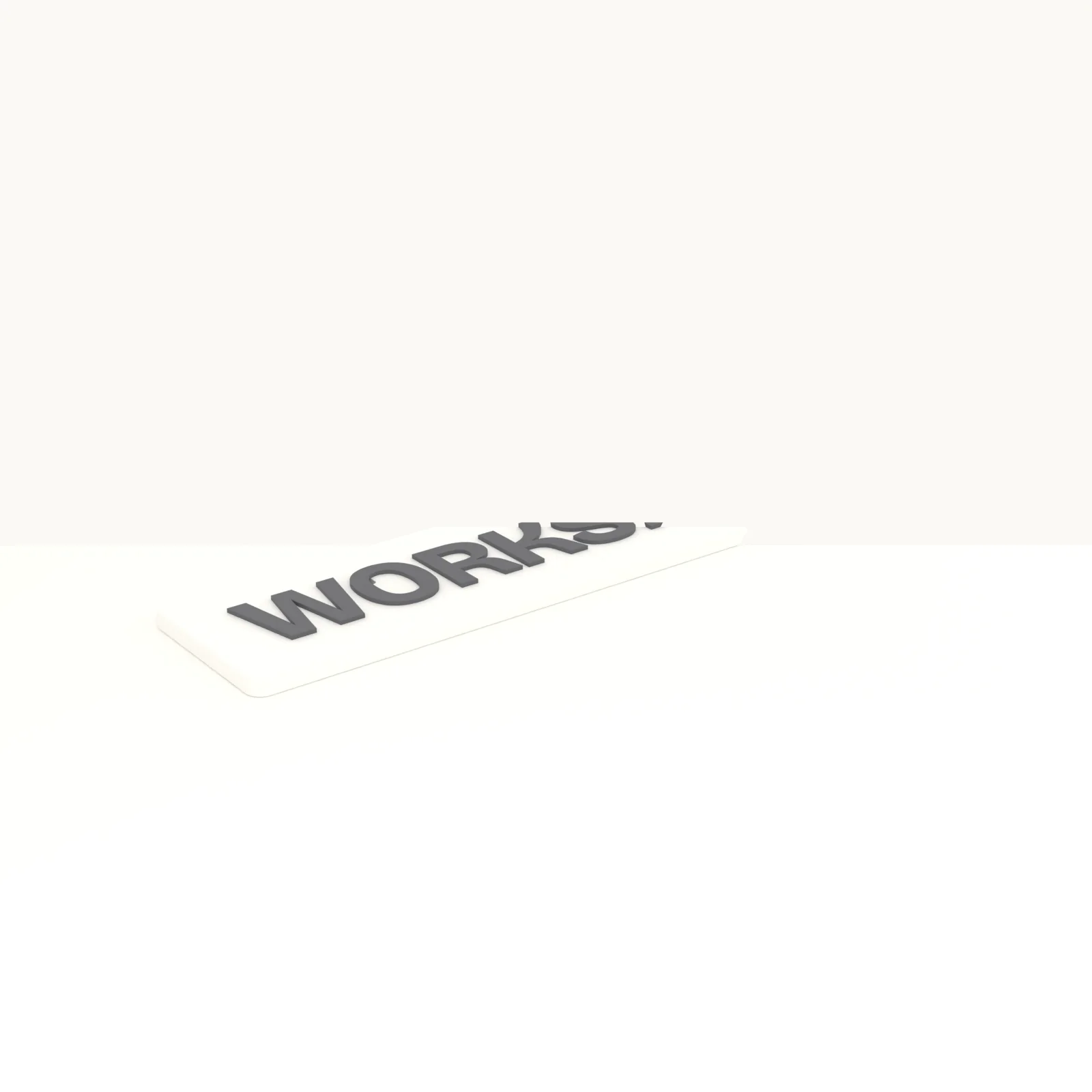Wall name plaque in white with raised black letters mounted on a wall