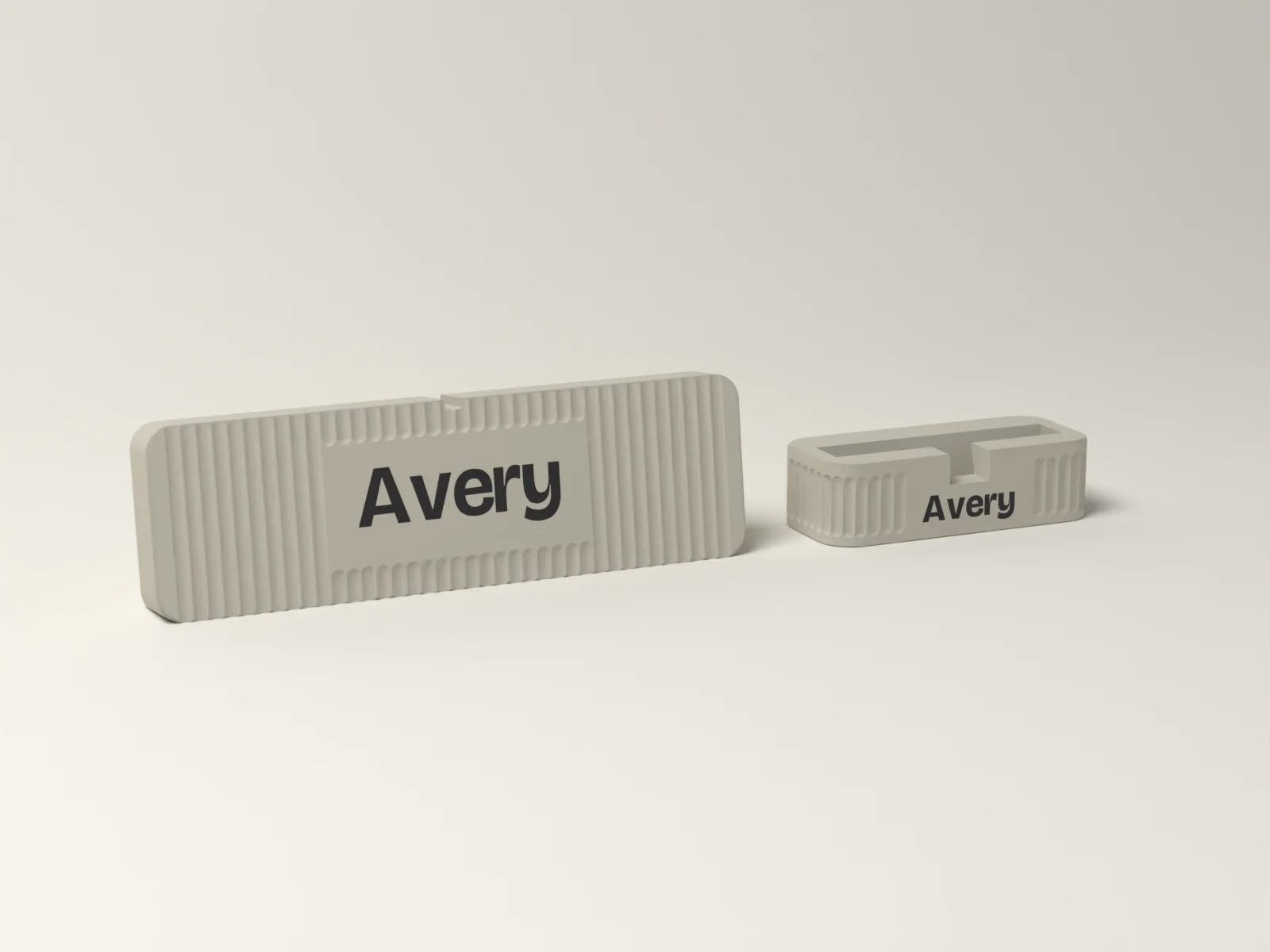 Desk Set in Gallery: a Fluted desk name plate reading Avery beside the matching fluted business card holder