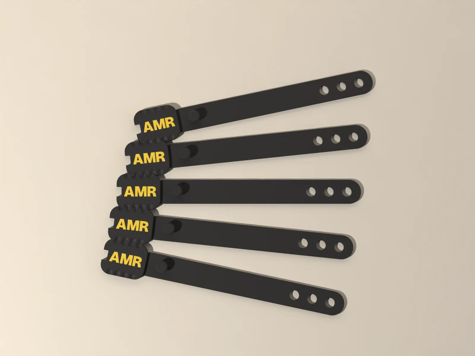 Cord keepers from above, the initials on each fluted tab