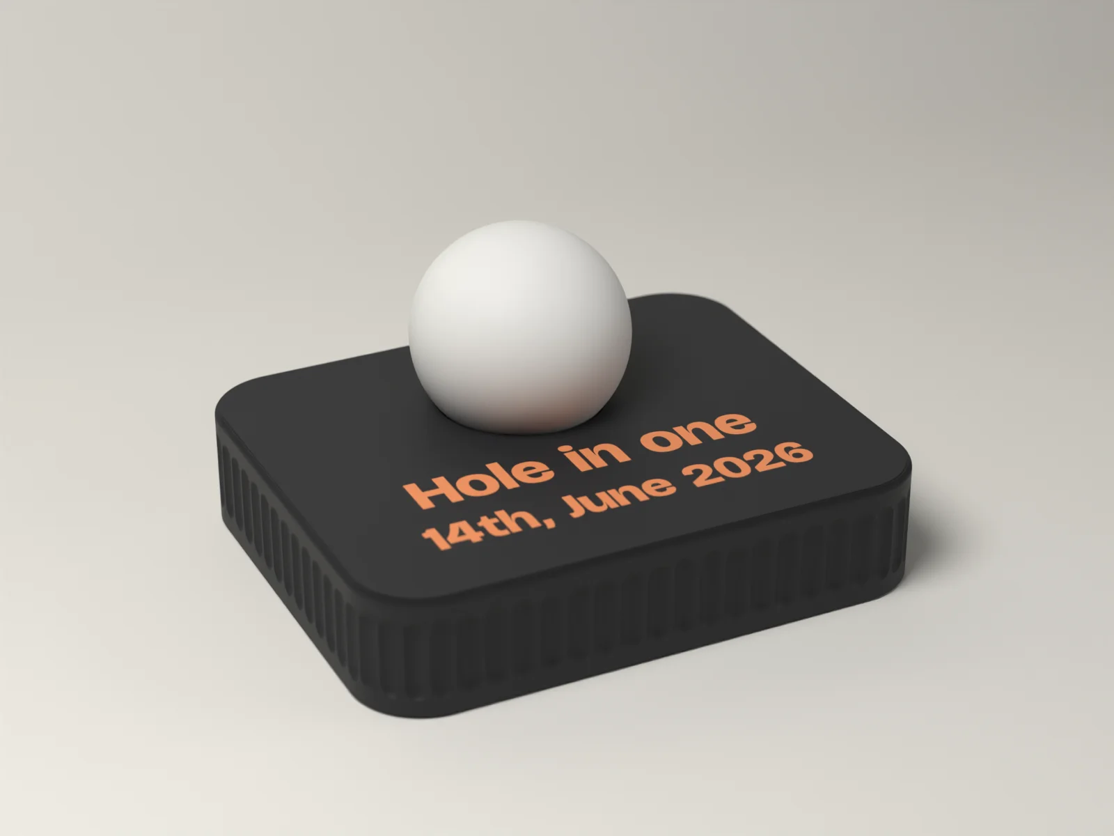 Golf ball display in Ink with a fluted plinth, one ball seat and Hole in one inlaid flush in Ember in front of it