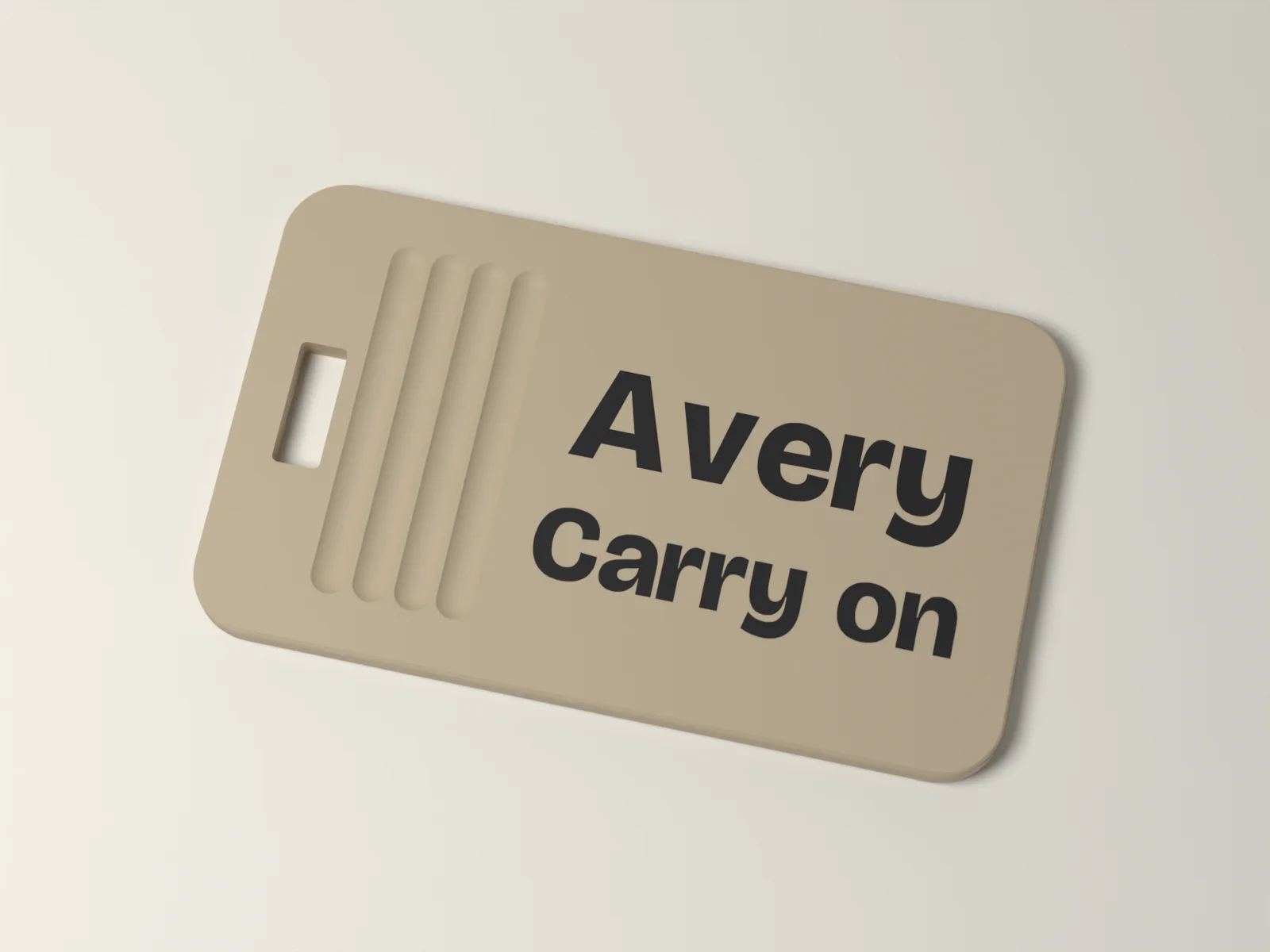 Luggage tag from above, the name inlaid flush on a smooth panel