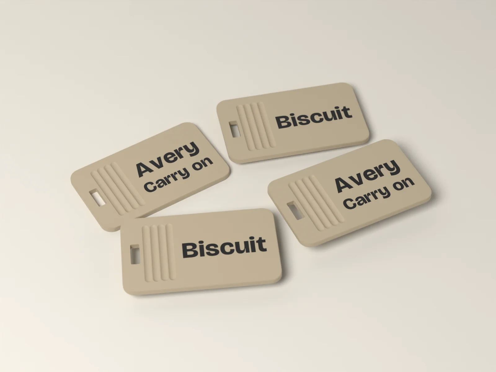 Four luggage tags in Gallery, Bone with Avery, Jordan, Rowan and Biscuit inlaid flush in Ink, fanned out