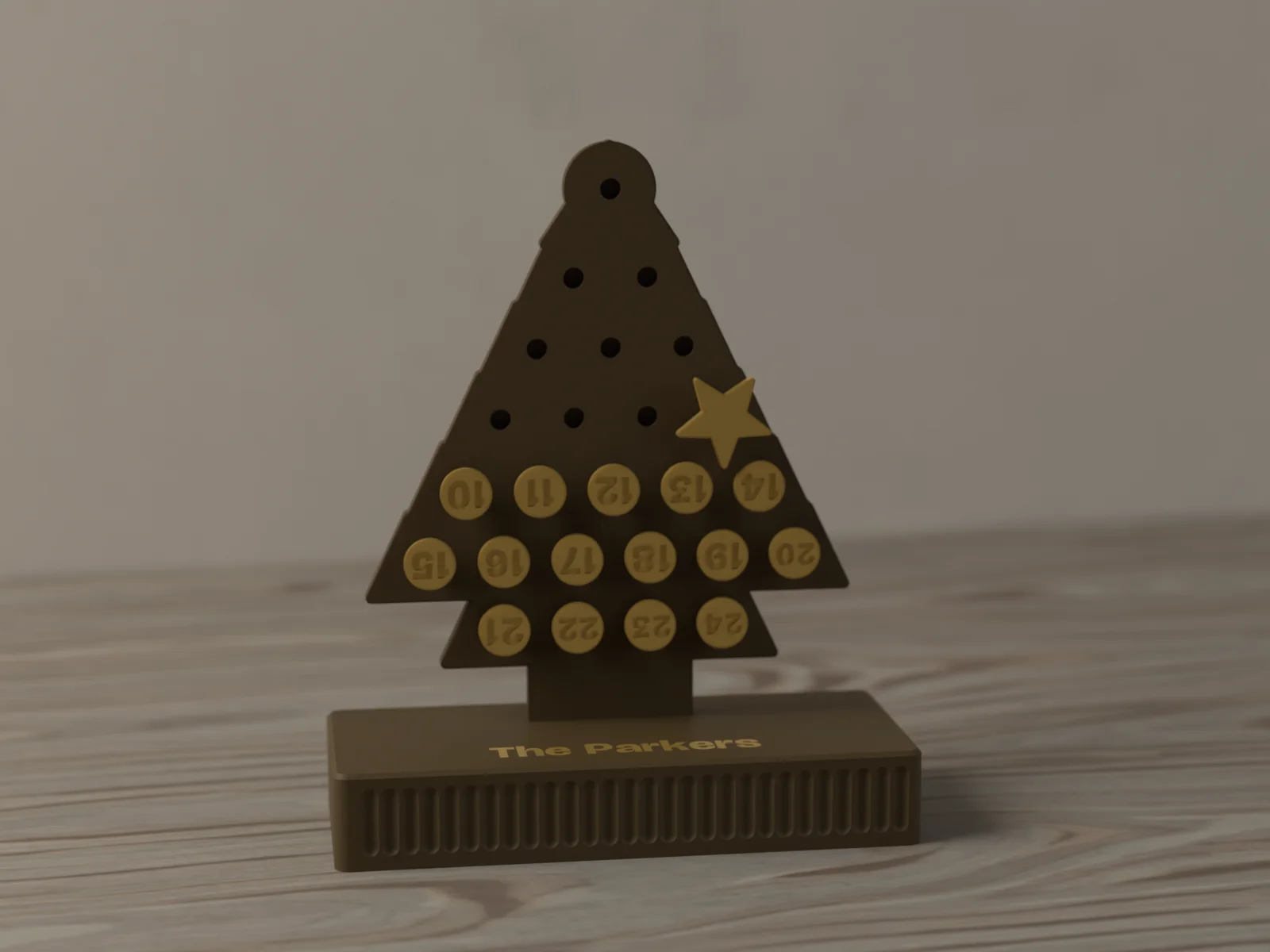 Advent countdown board on a walnut desk partway through December, the star moved into a token's place, an unlit LED tealight beside it