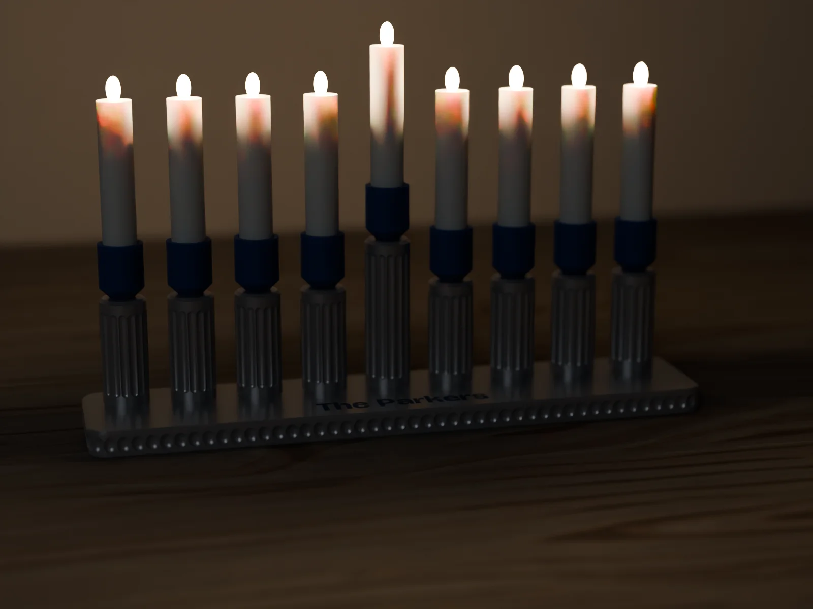 Display menorah with LED taper candles lit in a dark room