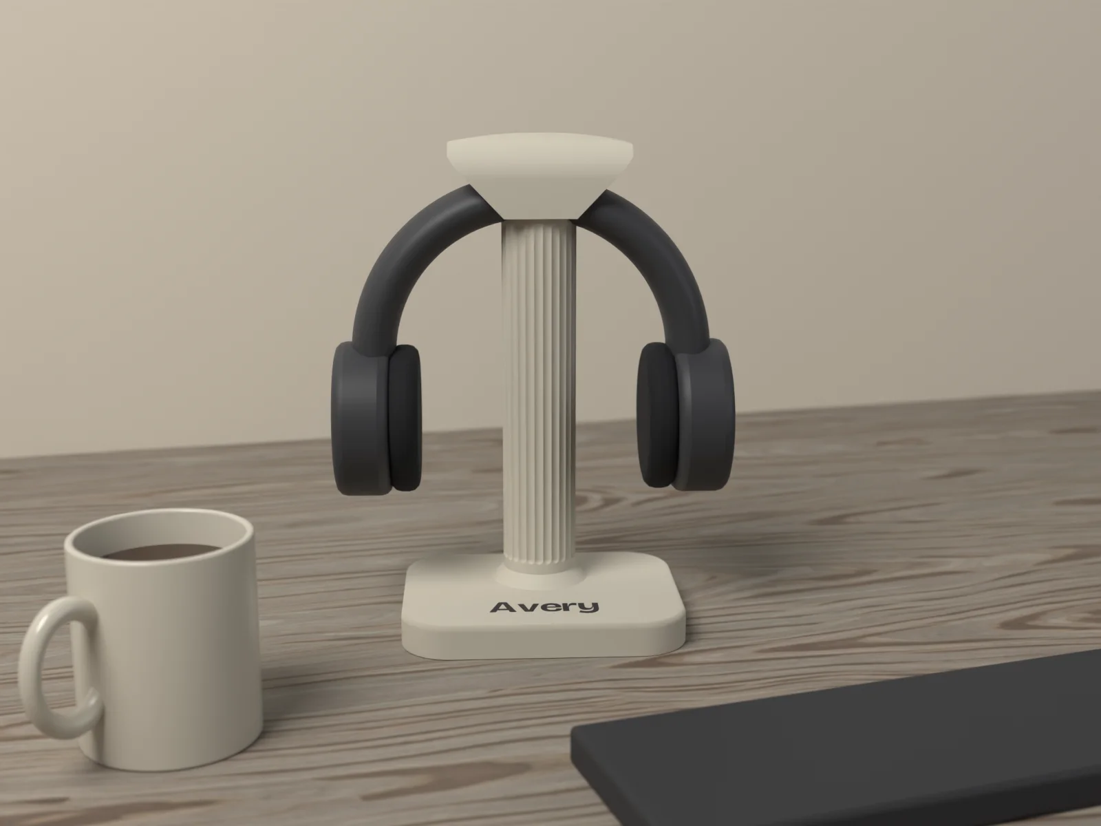 Over ear headphones resting on the stand beside a keyboard on a desk