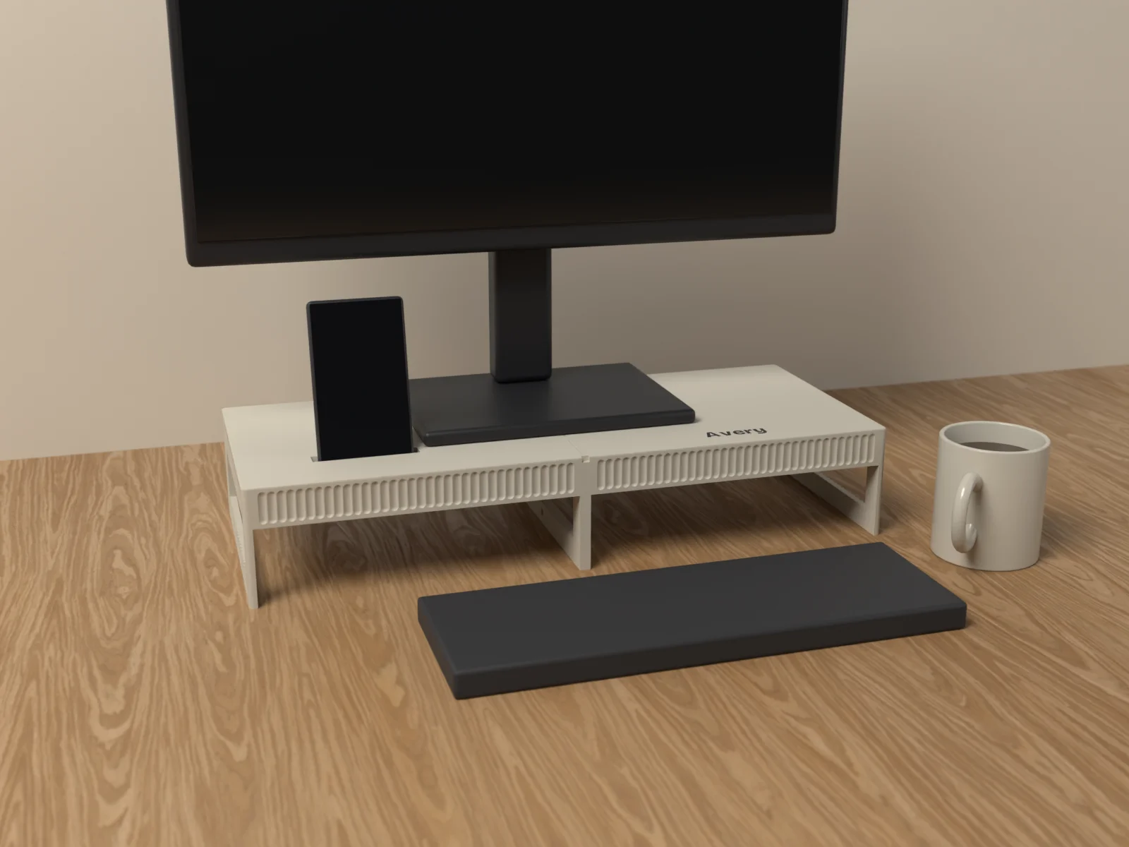 Monitor riser on an oak desk under a monitor, a phone standing in its slot and a keyboard tucked in front